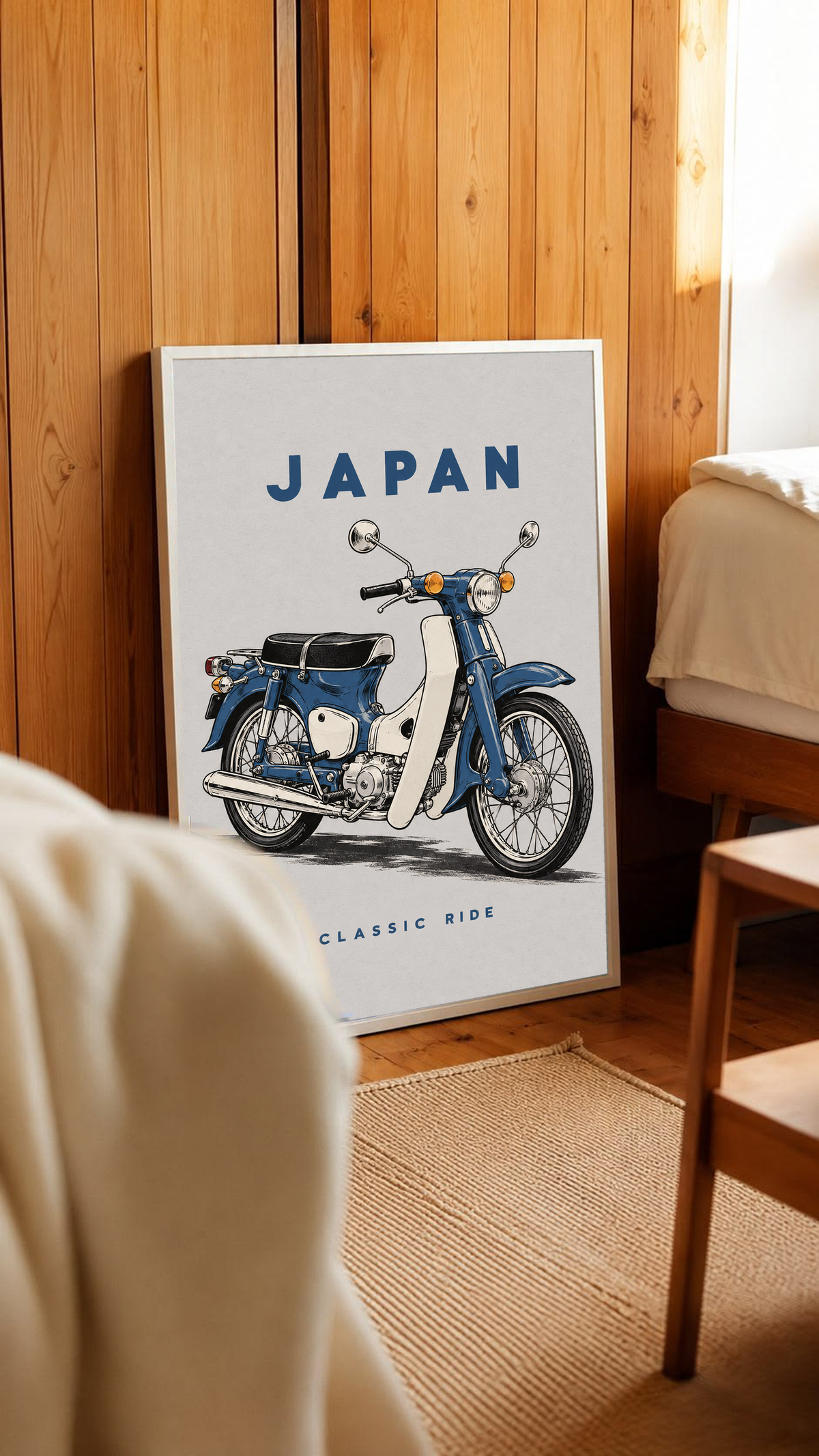White-framed Japan motorcycle poster with blue step-through bike and 'CLASSIC RIDE'.