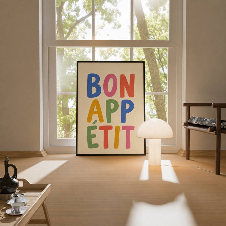 Black-framed typographic kitchen wall art with colorful BON APP ETIT lettering
