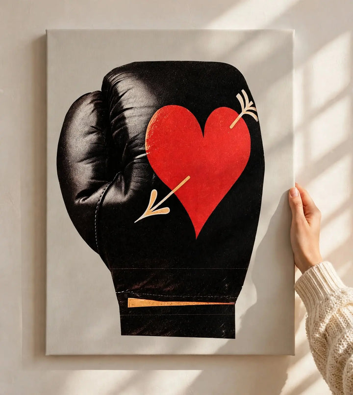 Boxing glove heart print on white poster paper, shown on wall