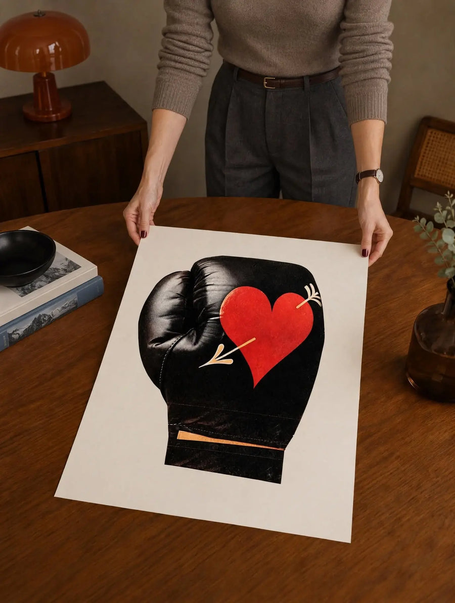 Boxing Love Print held vertically to show the graphic boxing glove, red heart and cream background