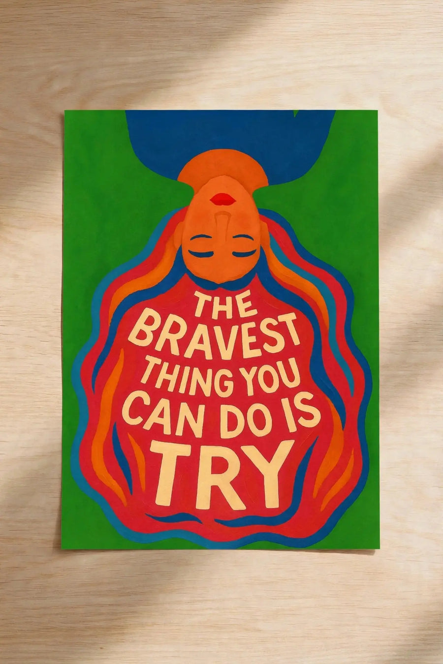 Green wall art poster with colorful bearded face and quote: BRAVEST THING YOU CAN DO
