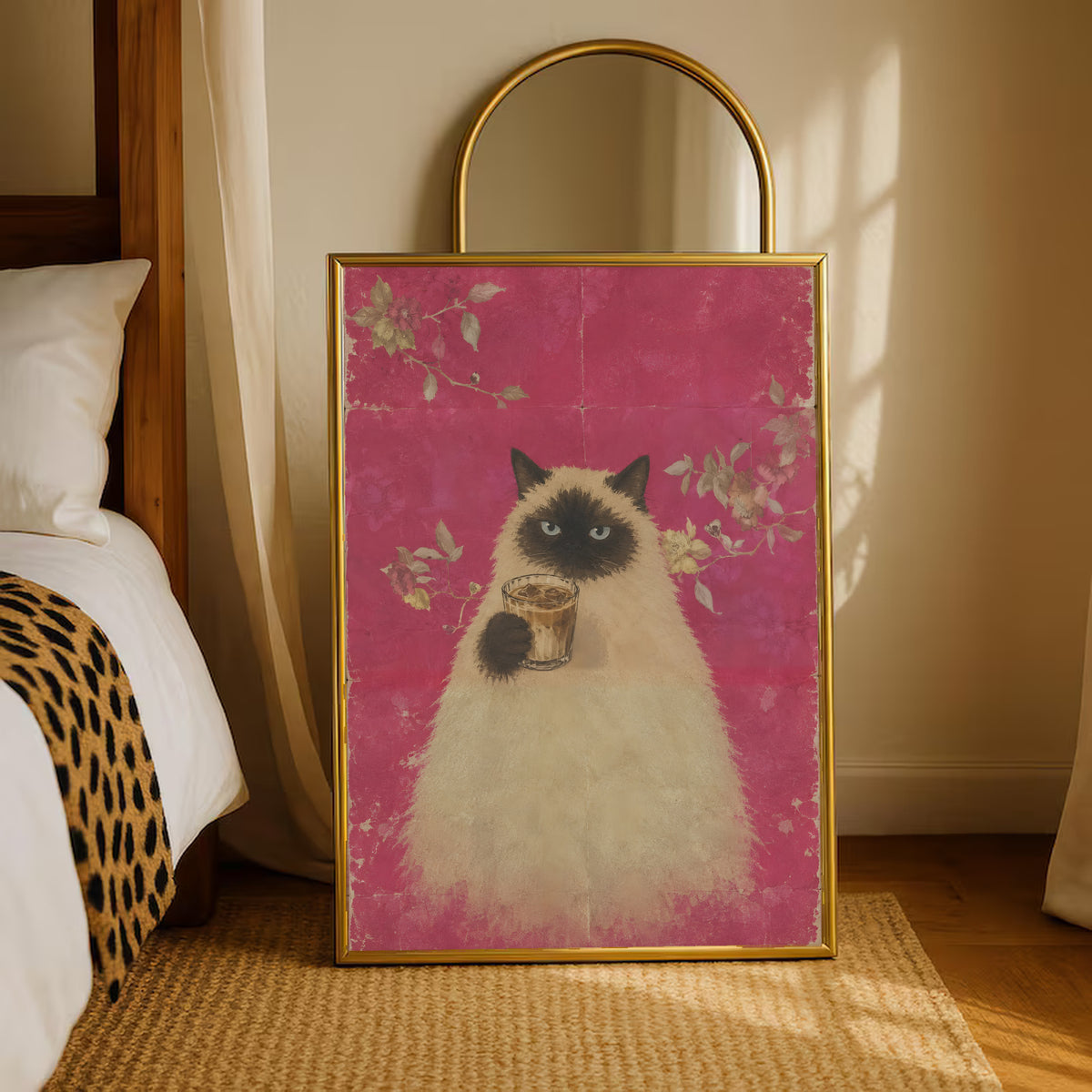 Gold-framed pink floral portrait of a fluffy cat holding a cup of coffee