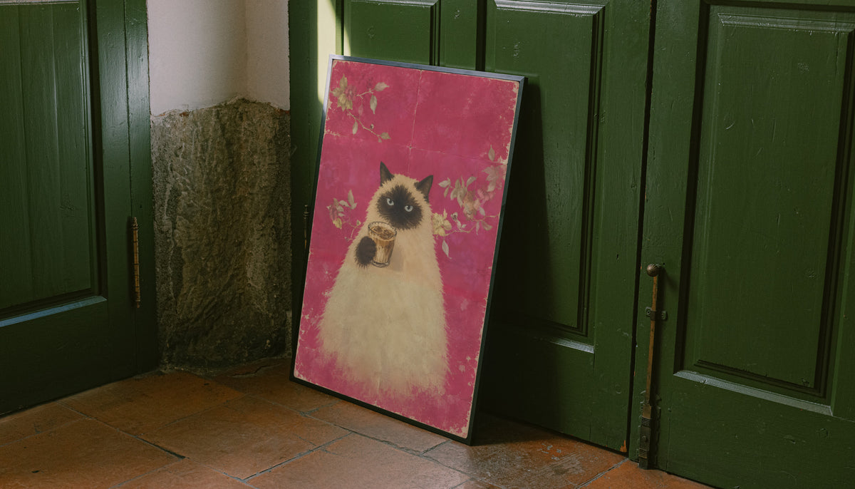Pink floral art print of a fluffy cat holding a cup of coffee
