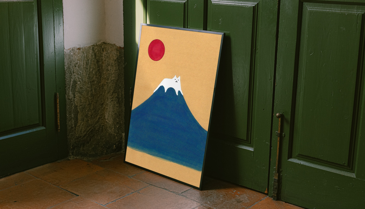 Art print with blue mountain, red sun, and white cat leaning by door