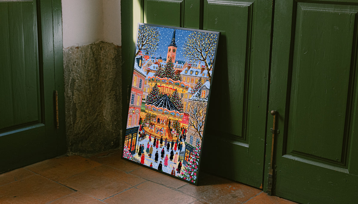Christmas carousel canvas print depicting a snowy village square and festive carousel.