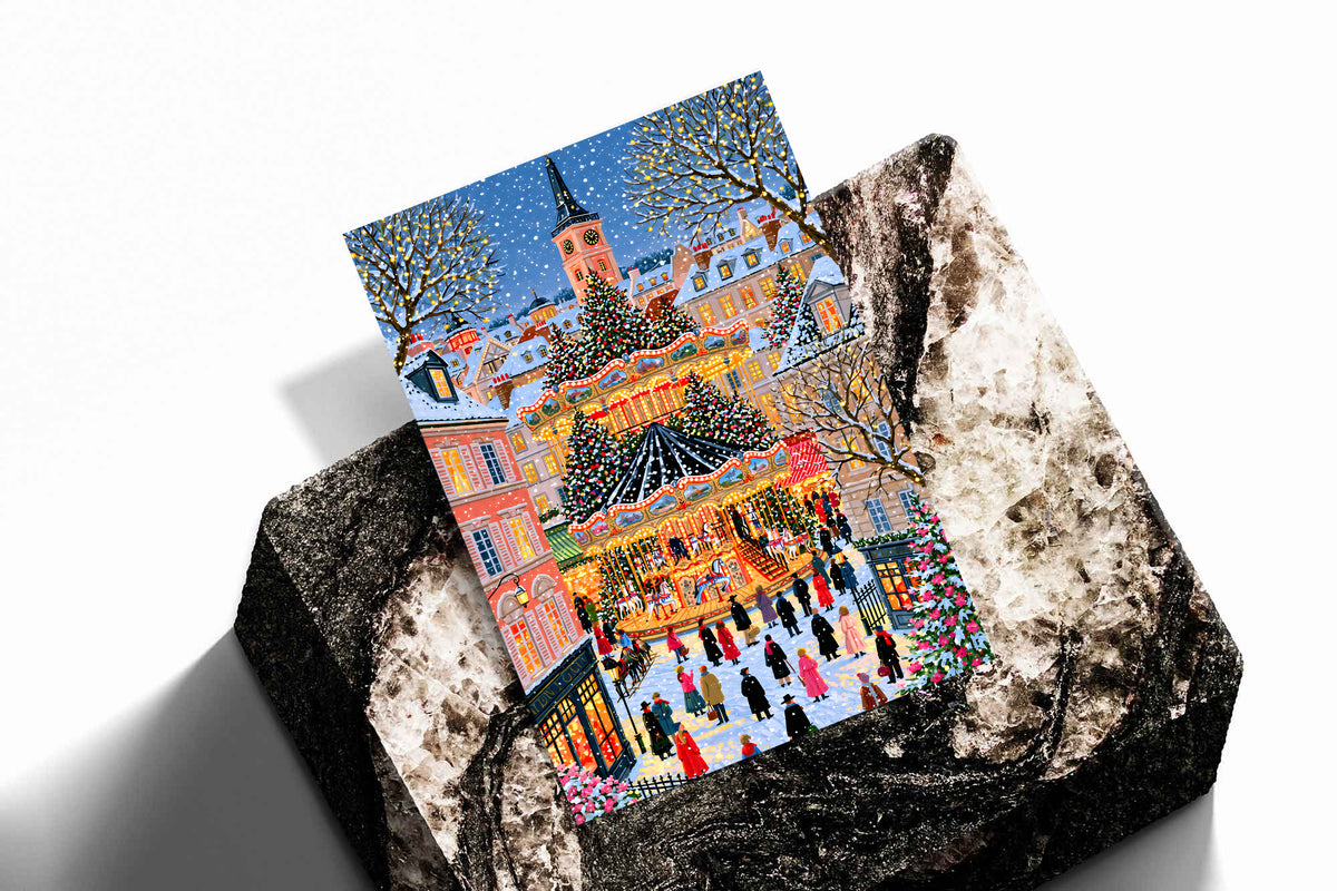 Christmas carousel art print depicting a village square, carousel, and decorated Christmas tree.