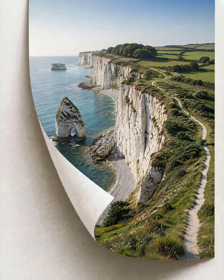 Coastal Cliff Art Print featuring blue sea, textured cliffs and fresh green vegetation