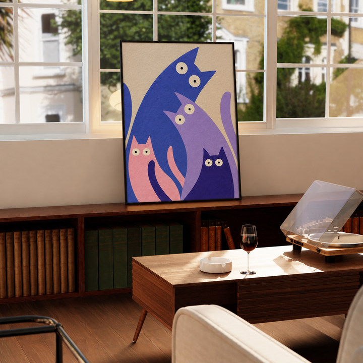 Four colourful cats wall art displayed in styled interior view 3