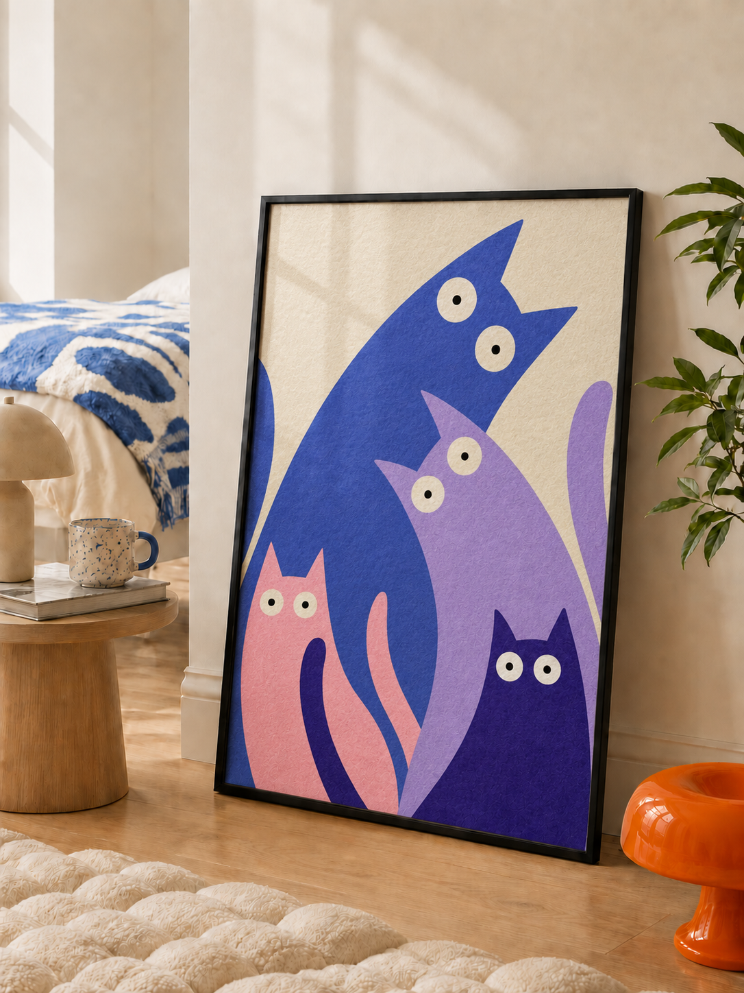 Four colourful cats wall art displayed in styled interior view 4