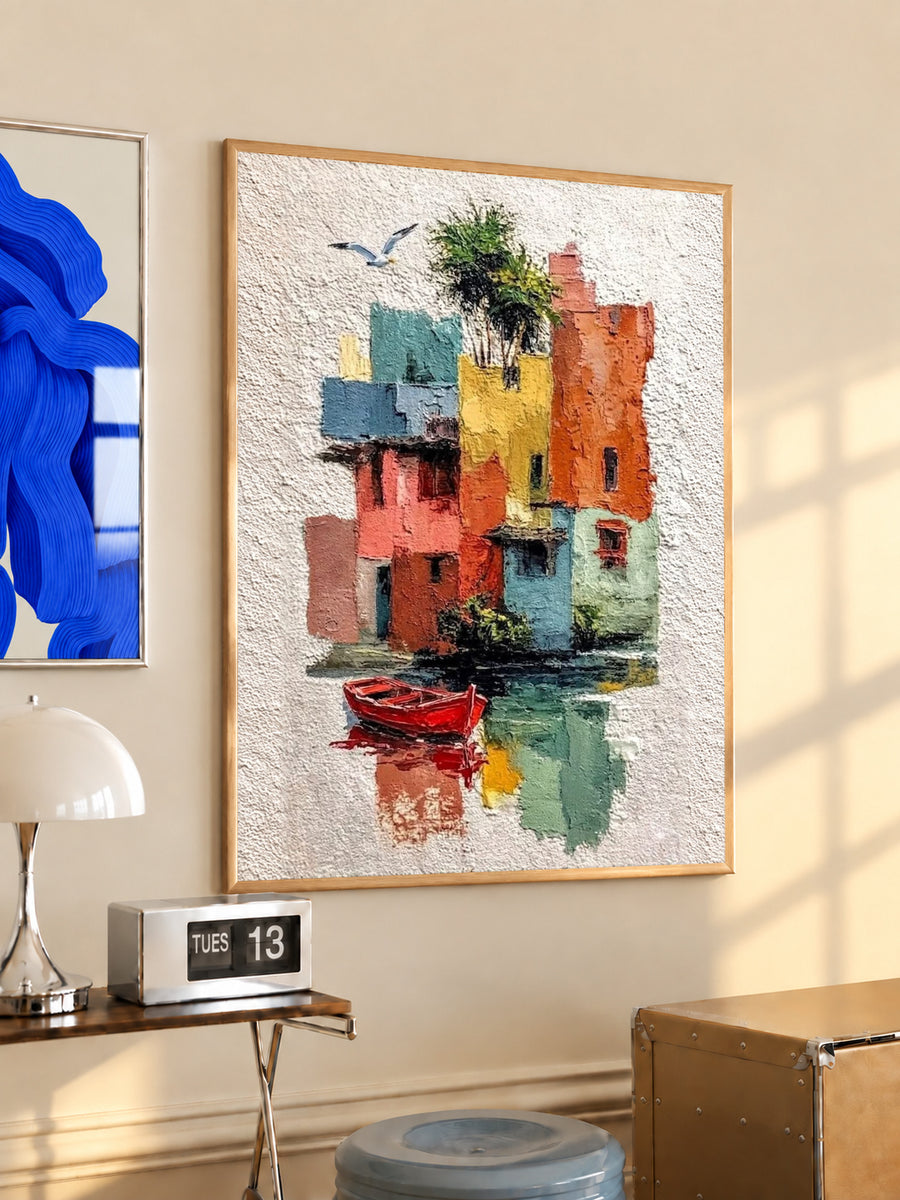 Framed harbor village wall art with red boat and multicolor waterfront buildings