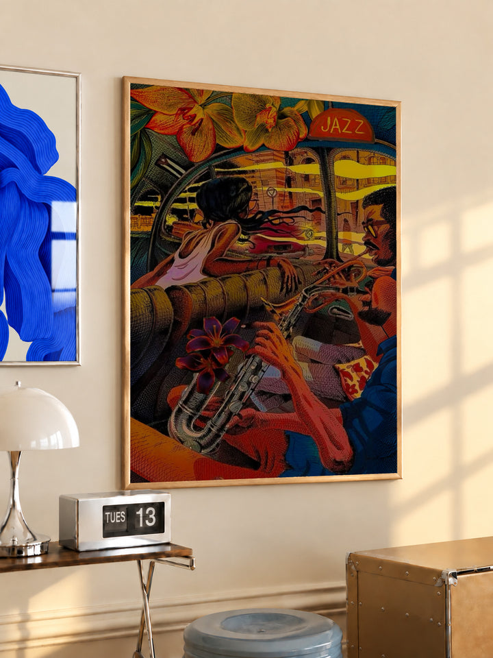 A trumpet player and lively jazz club interior in orange, red, yellow and deep blue in a light wood frame on a sunlit office wall beside a desk