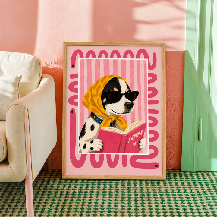 Oak-framed Dalmatian reading poster leaning against a coral wall beside a cream armchair and mint door.