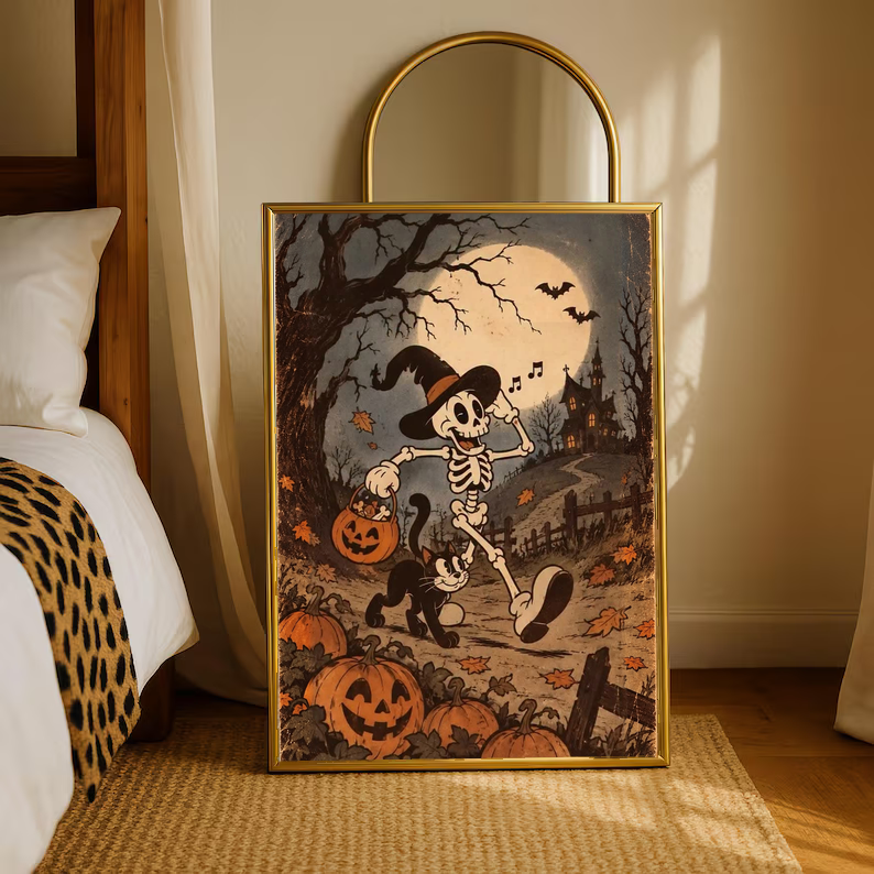 Halloween gold-framed poster featuring a dancing skeleton with broom, pumpkins and moonlit path