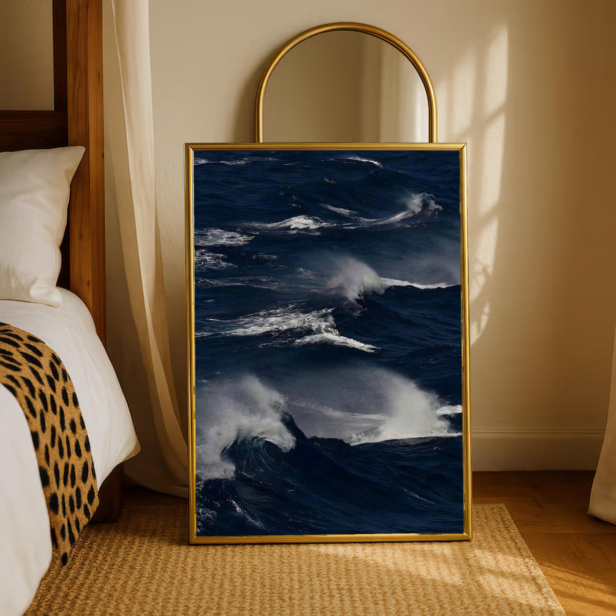 Gold-framed ocean waves print with white crests and dark blue wave texture