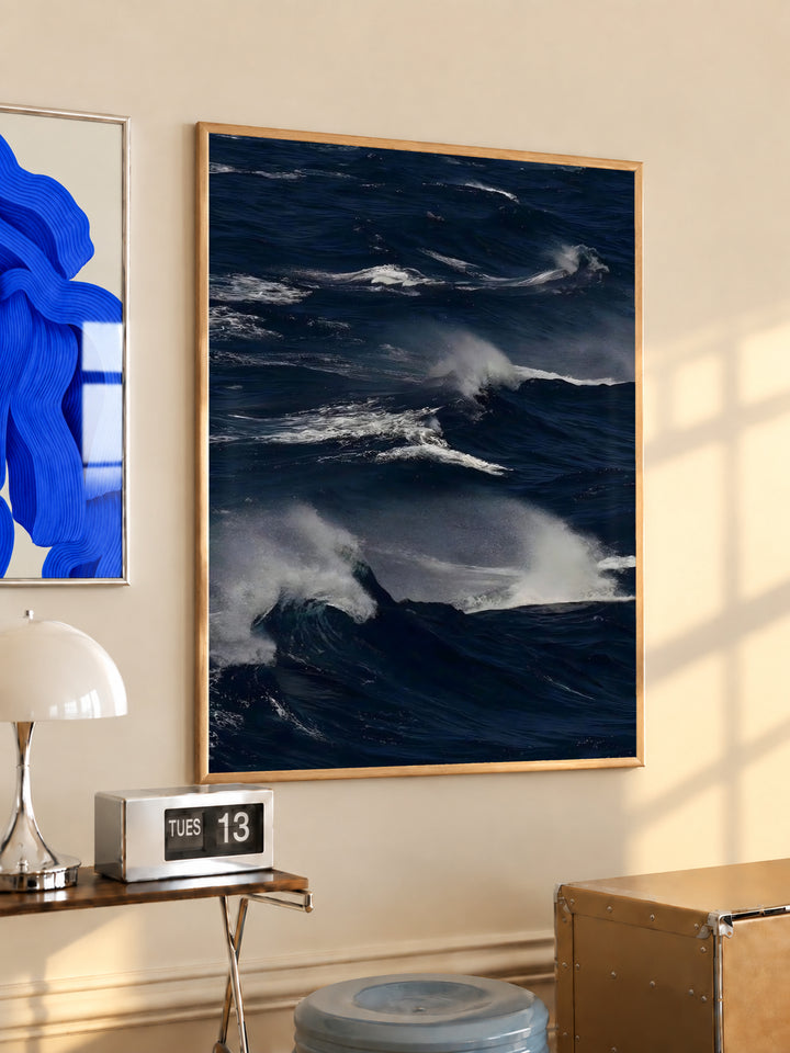 Gold-framed ocean waves wall art with white foam crests on dark blue sea