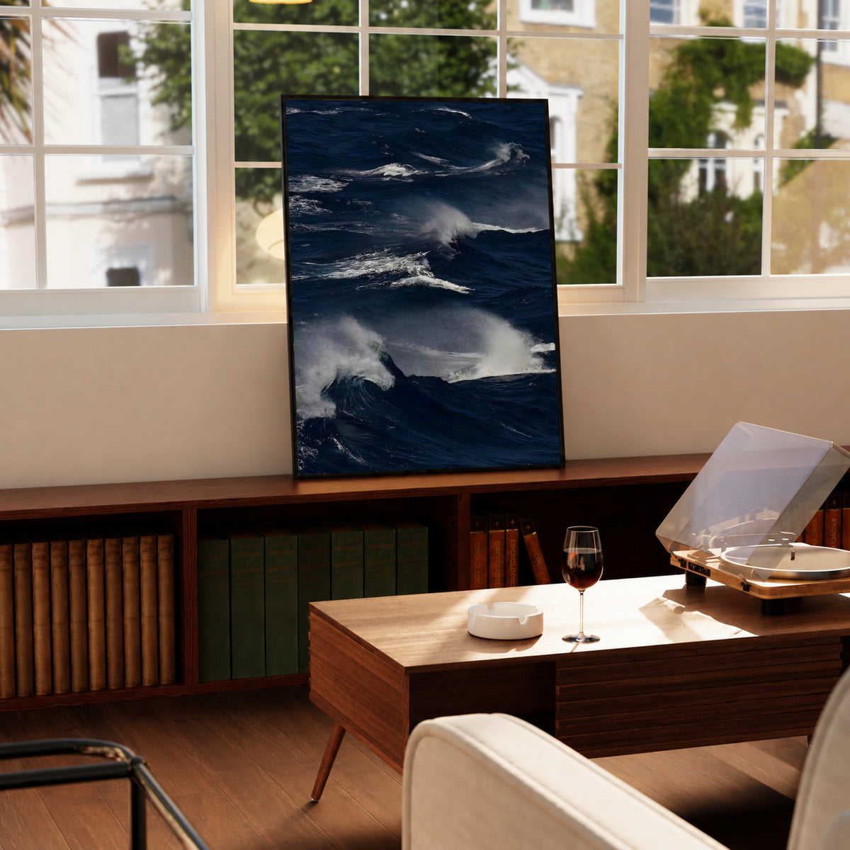 Black-framed dark blue ocean waves print with white foam highlights