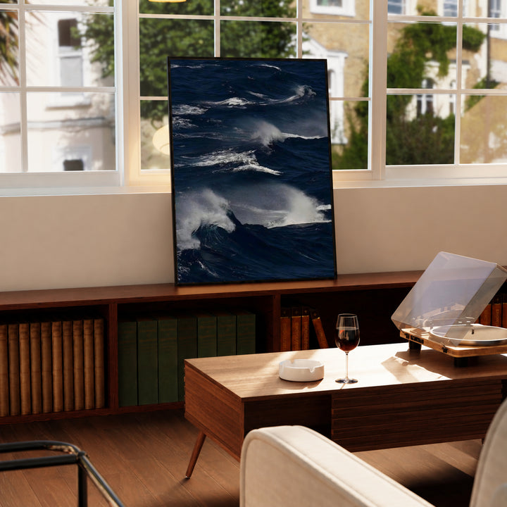 Black-framed dark blue ocean waves print with white foam highlights