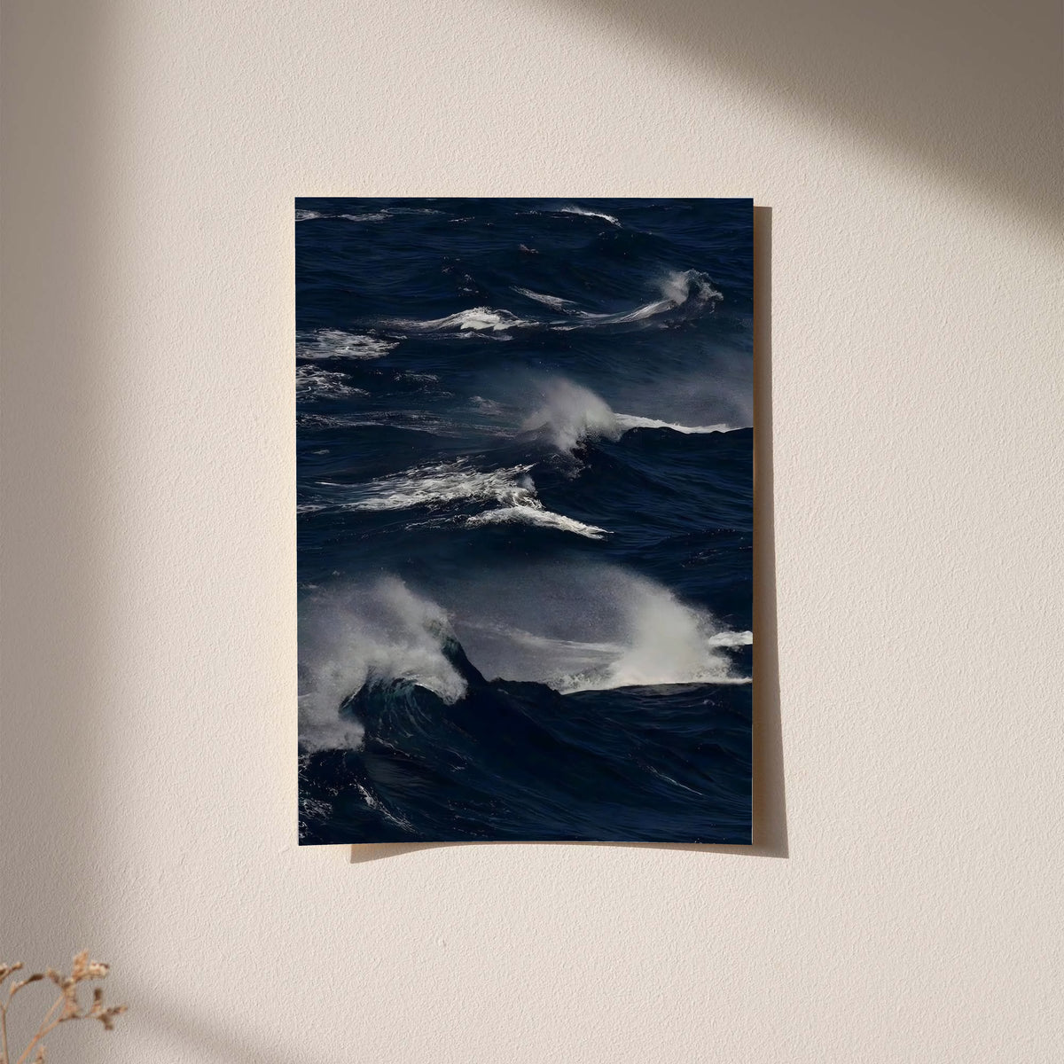 Dark blue ocean waves print with white crests and gray cloudlike sea texture