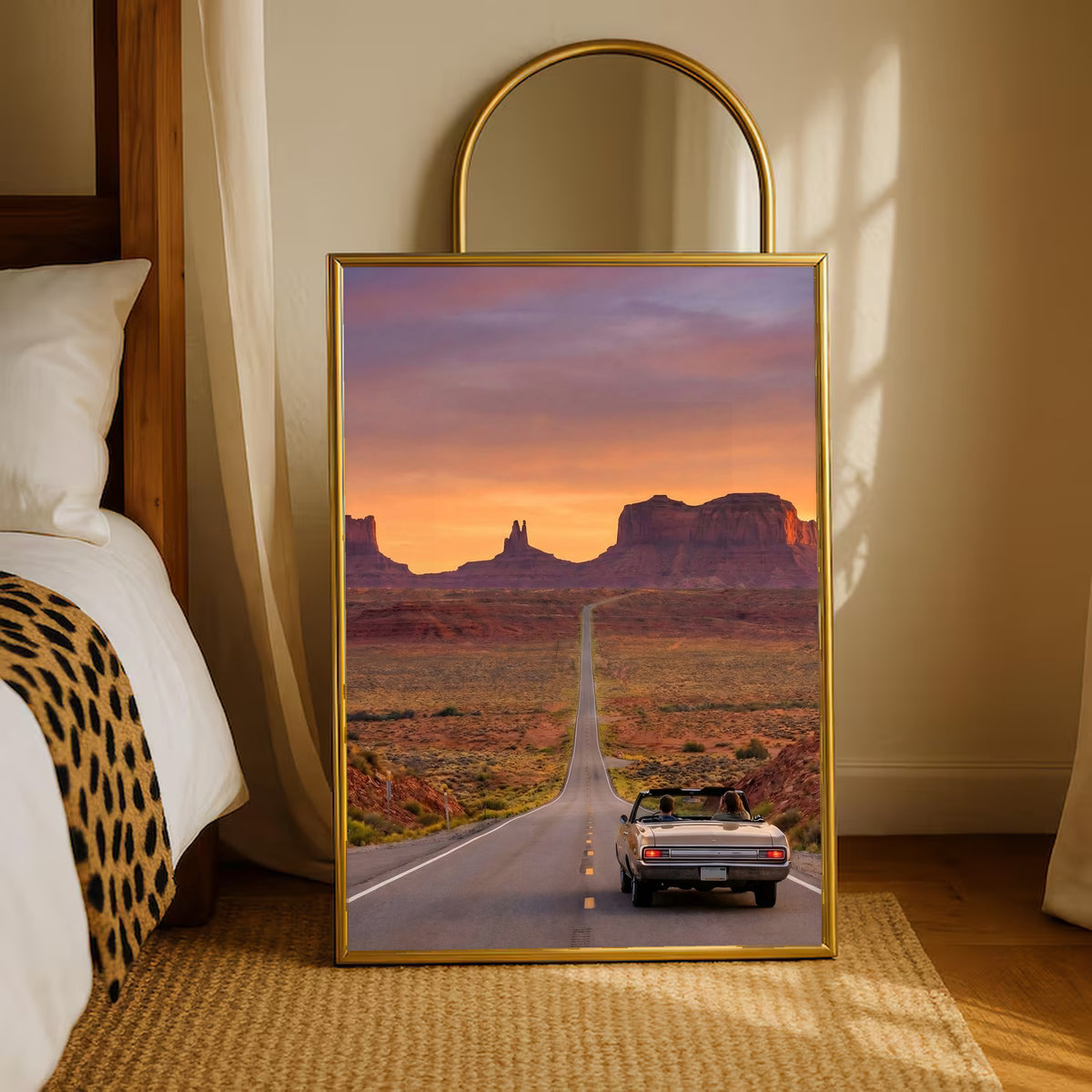 Gold-framed desert road poster with convertible car on desert highway at sunset