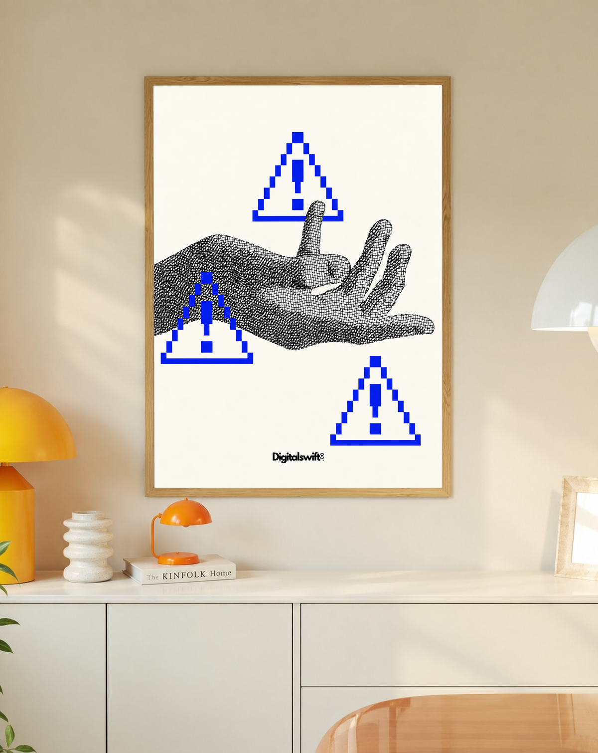 A monochrome halftone hand surrounded by three blue pixel warning triangles in a slim oak frame on a cream wall above a white cabinet