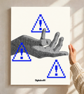 A monochrome halftone hand surrounded by three blue pixel warning triangles as an unframed poster held against a pale sunlit wall