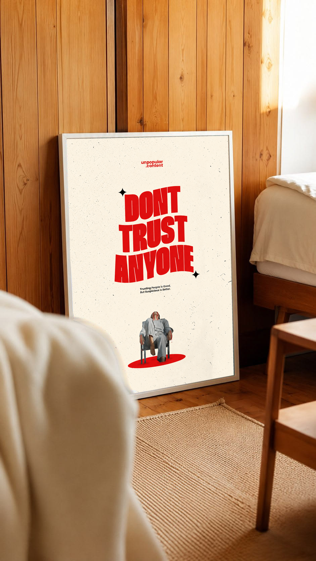 Bold red Don't Trust Anyone typography above a small seated figure on cream in a white frame leaning against warm wooden wall panels