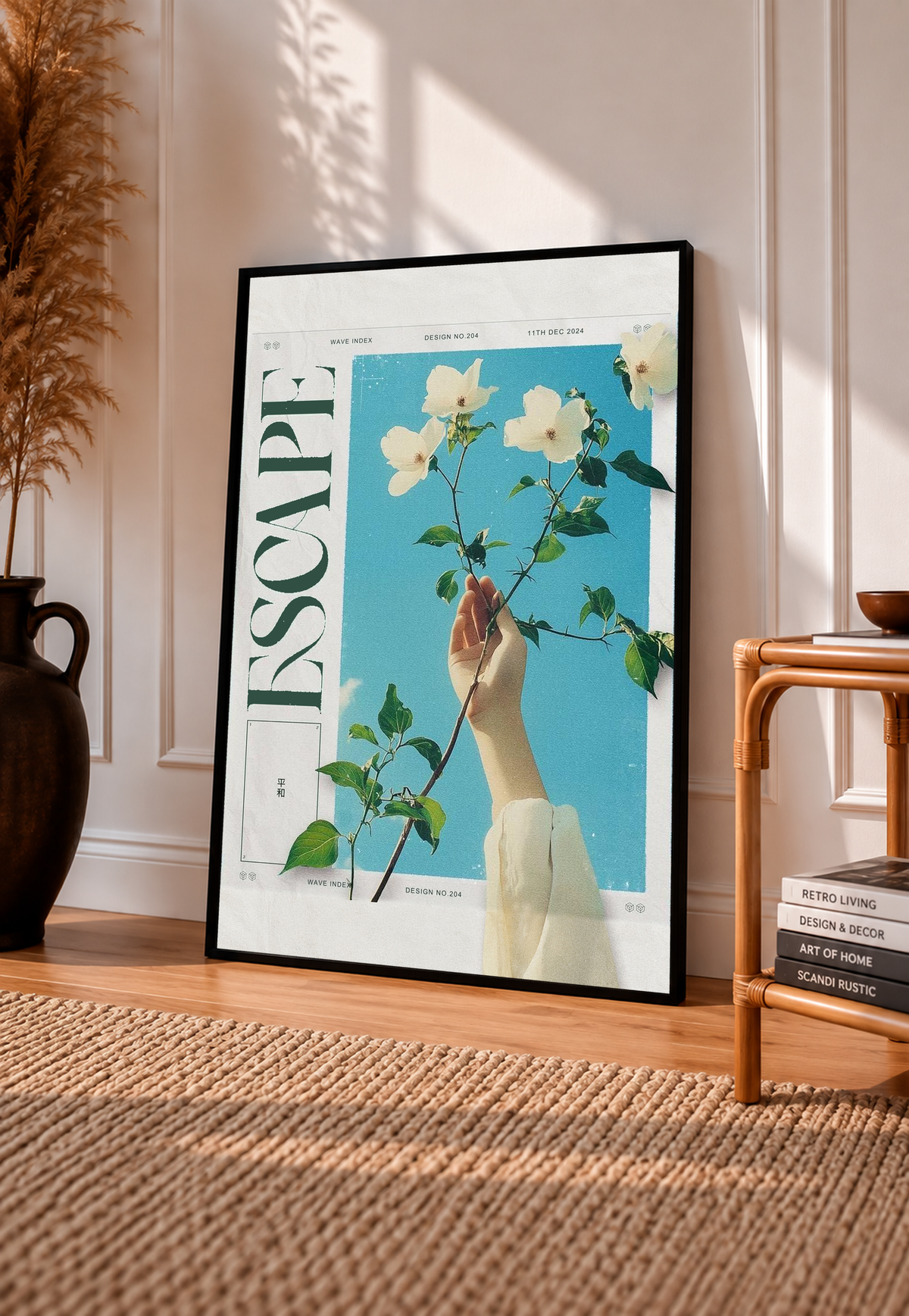 Floral poster in black frame, showing a hand holding white flowers over blue