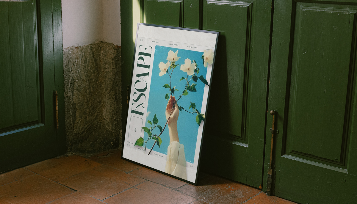 Floral poster in white frame, featuring a hand holding white flowers over blue