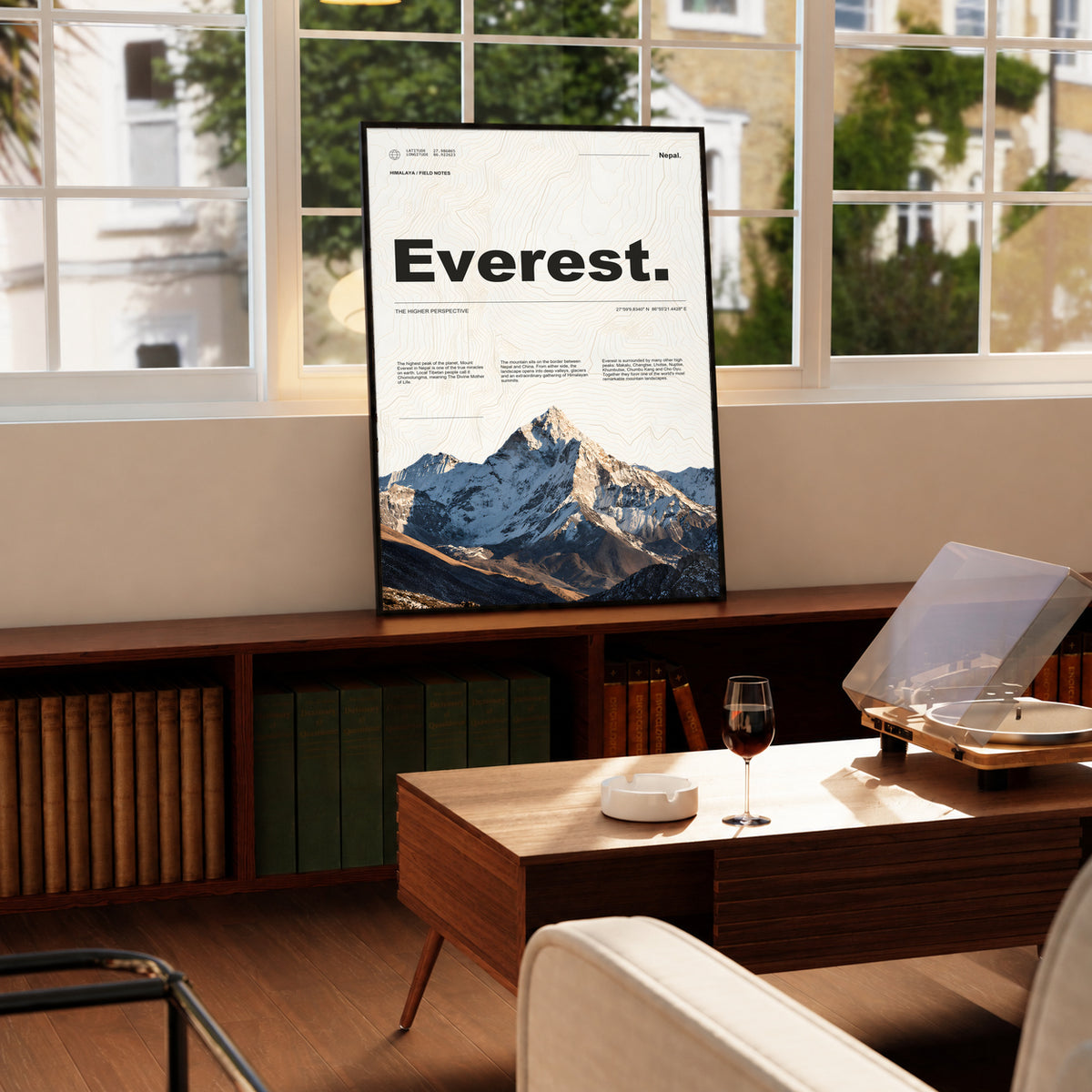 Black-framed Everest poster with topographic details and a mountain photograph.