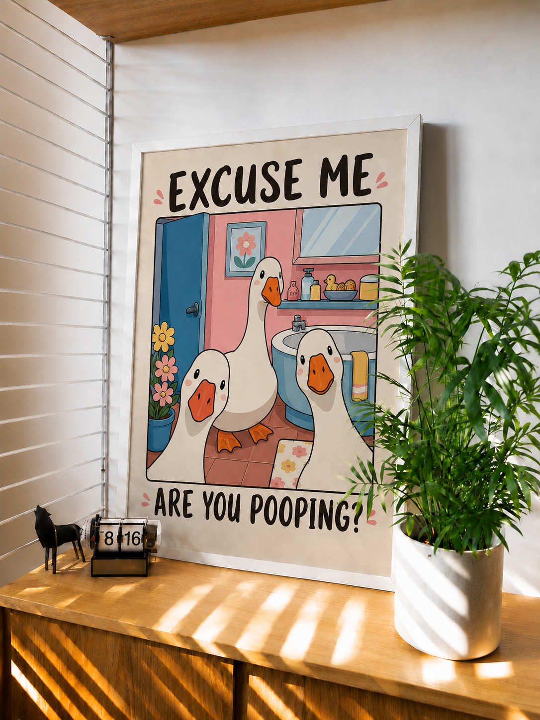 Framed funny goose wall art with 'EXCUSE ME' and 'ARE YOU POOPING?' text
