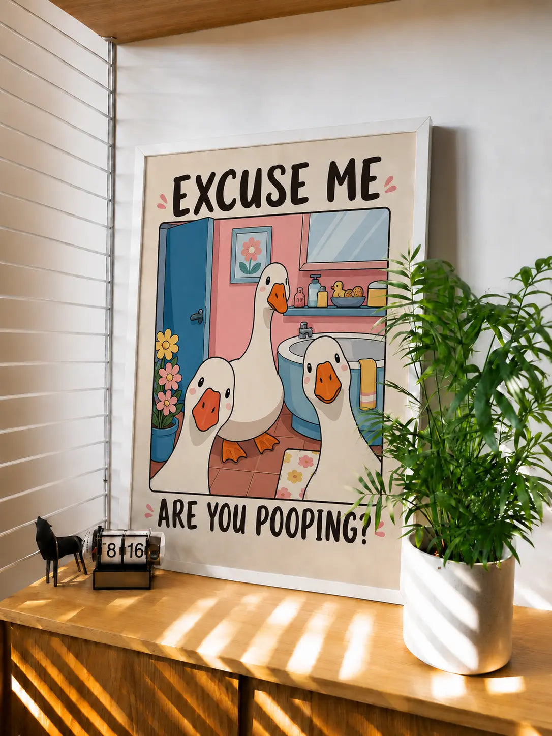 Framed funny goose wall art with 'EXCUSE ME' and 'ARE YOU POOPING?' text