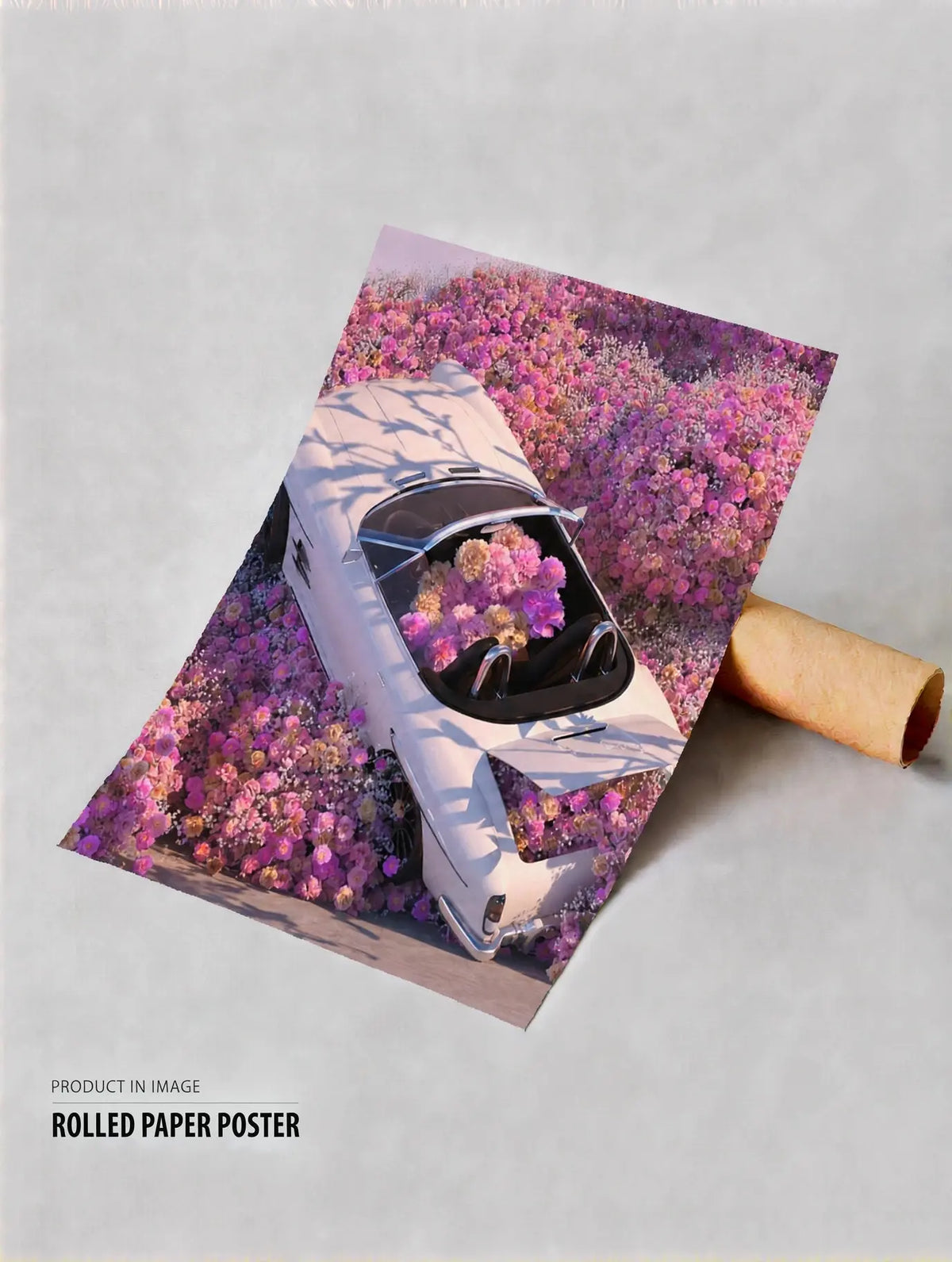 Rolled paper poster featuring a silver car in a pink flower field