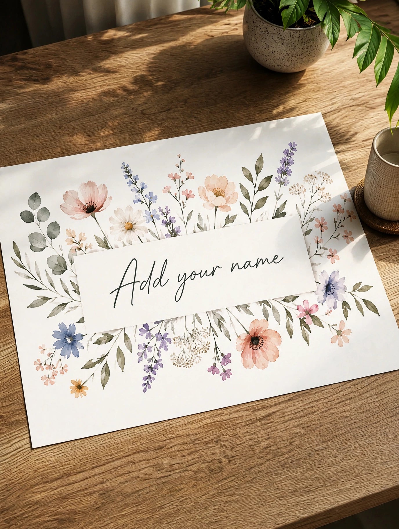 Personalized Name Art Print shown as custom floral wall decor in a bright neutral interior