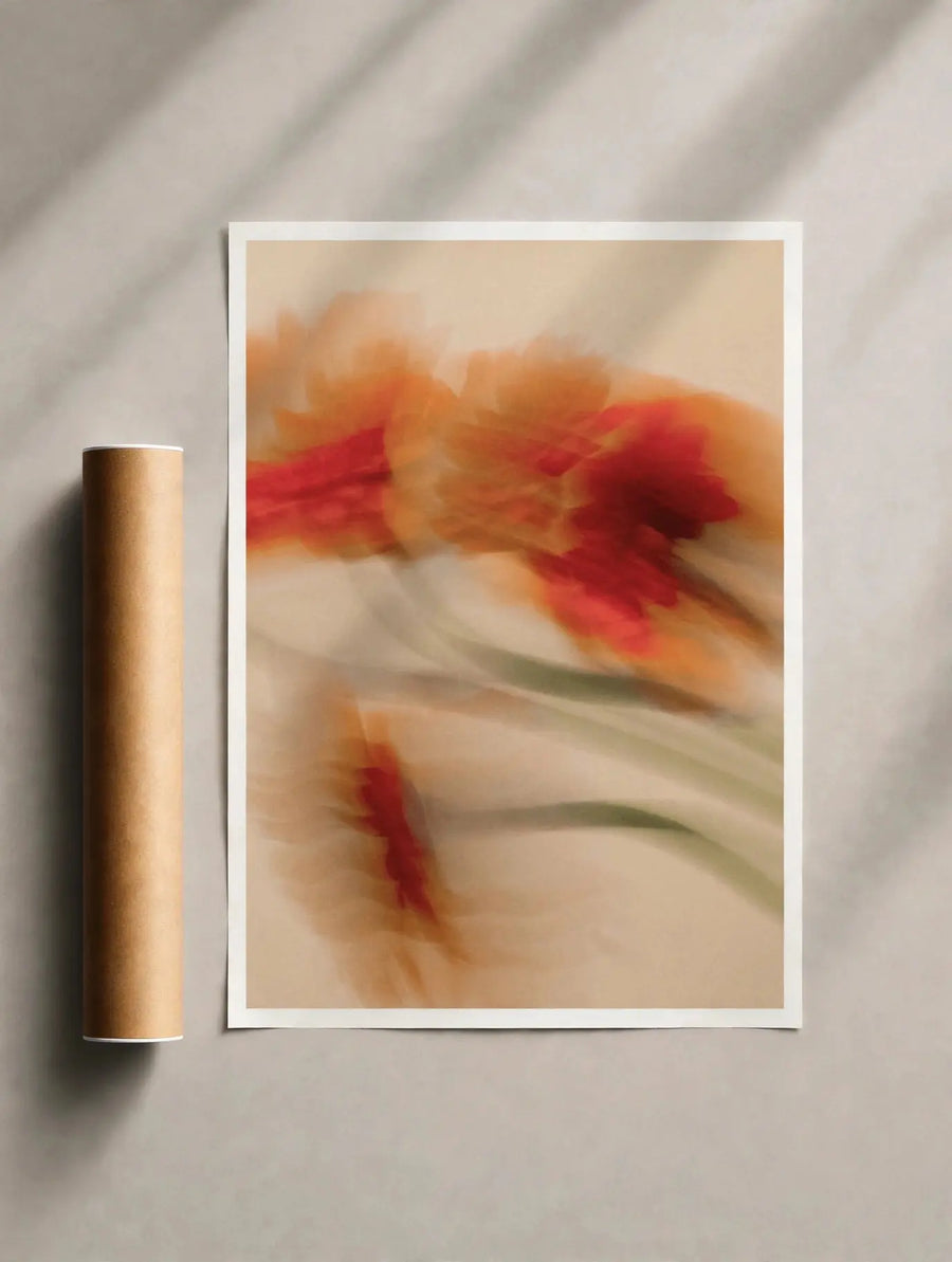 White-framed pink and red floral print with motion-blur flower details