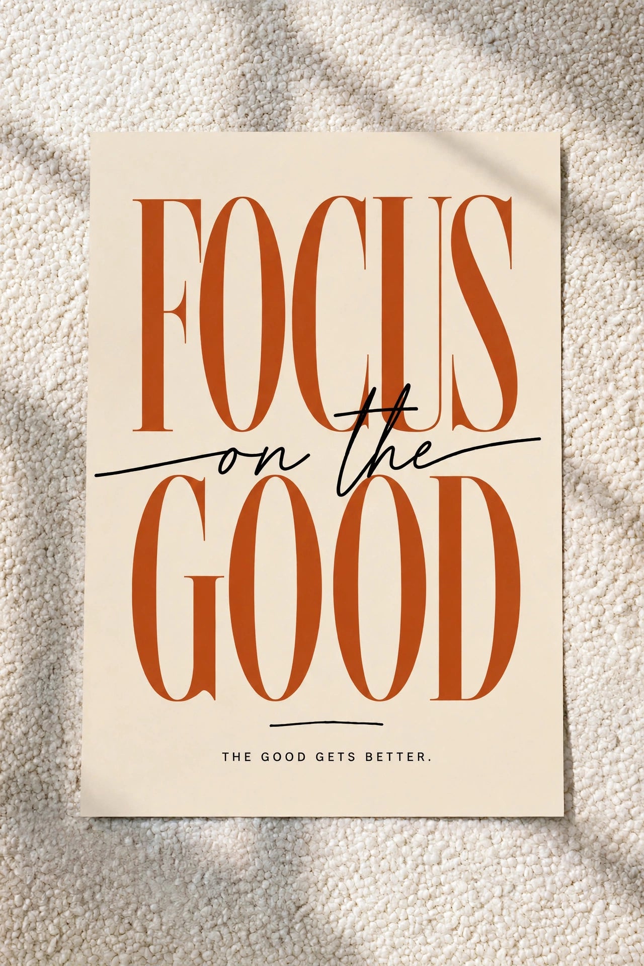 Wall art poster with 'FOCUS on the GOLD' typography, warm gold tones.