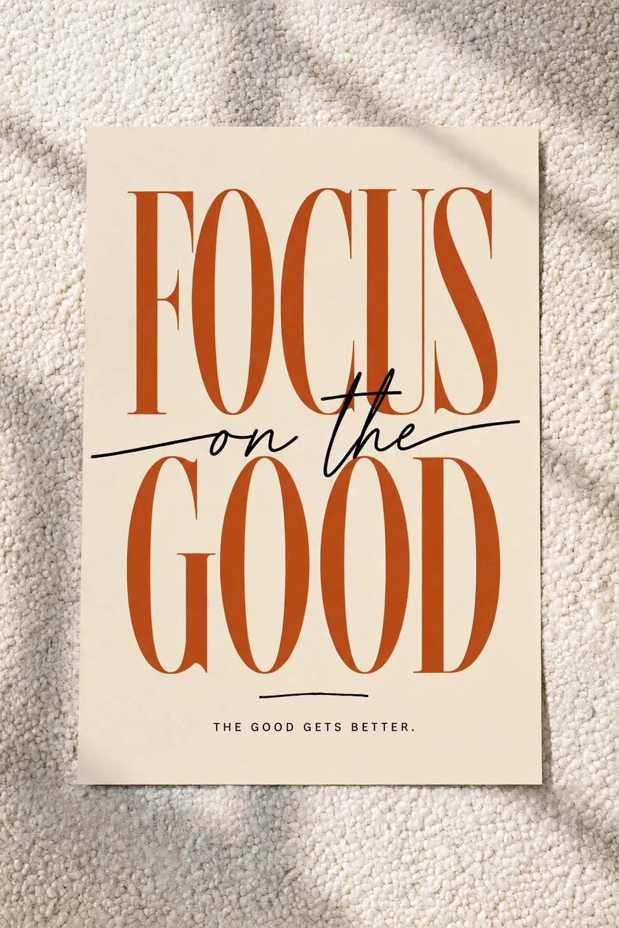 Wall art poster with 'FOCUS on the GOLD' typography, warm gold tones.