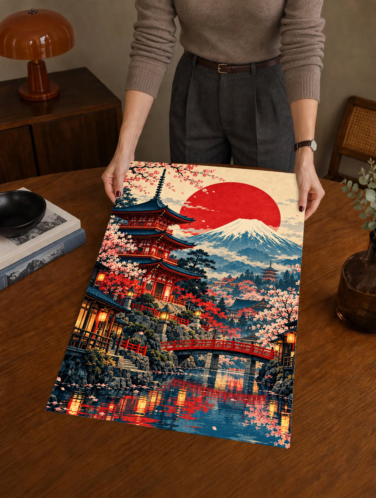 Large framed Japan landscape wall art being placed on a wooden floor: Mount Fuji and pagoda