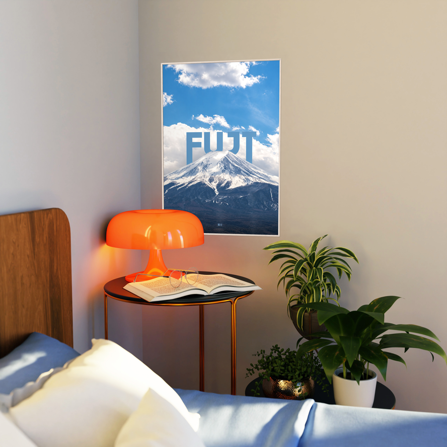 Framed Mount Fuji poster with bold white FUJI lettering and blue sky mountain view
