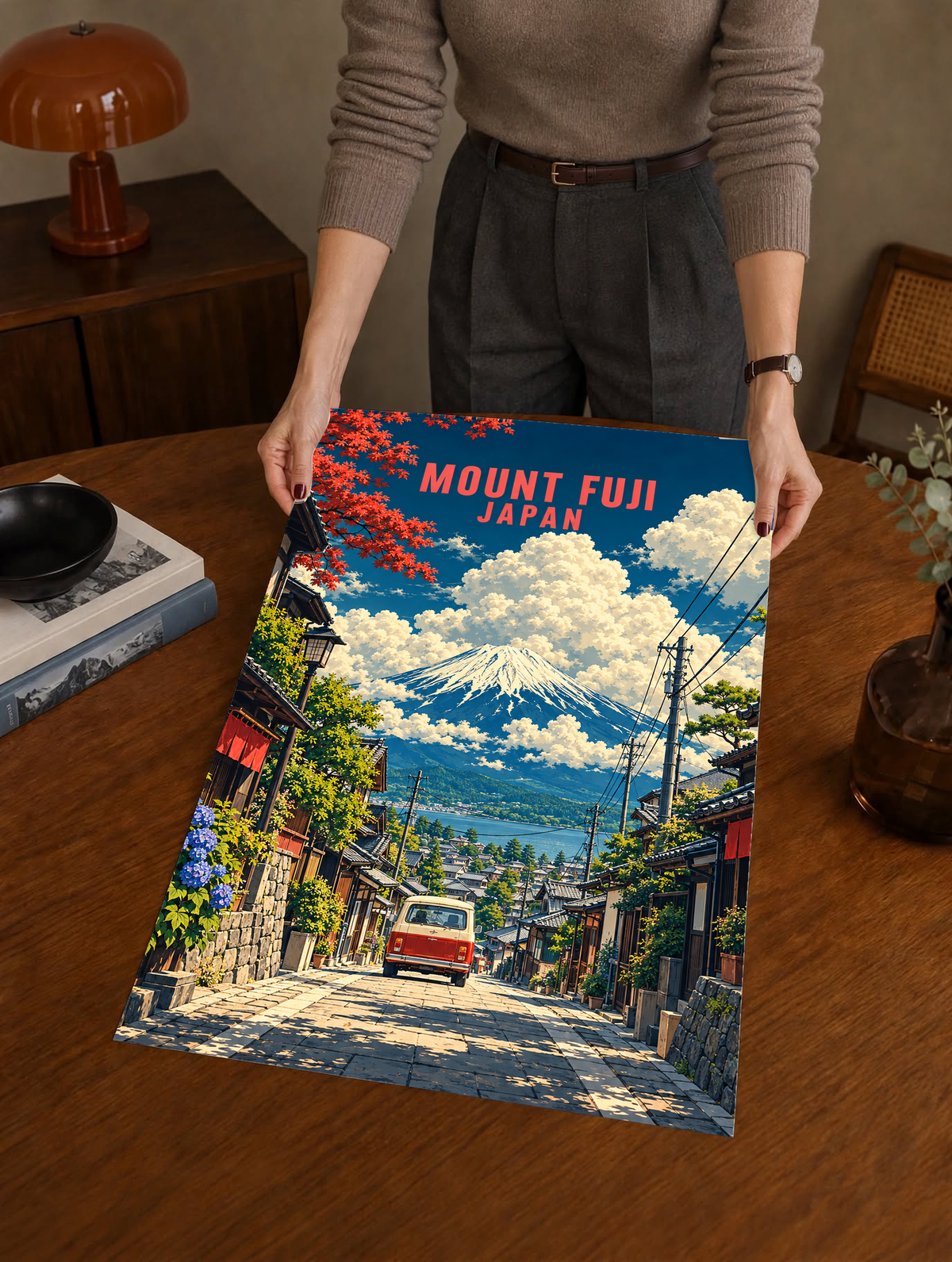 Framed Mount Fuji street scene poster held in hands, red van and Mt. Fuji; “MOUNT FUJI JAPAN”