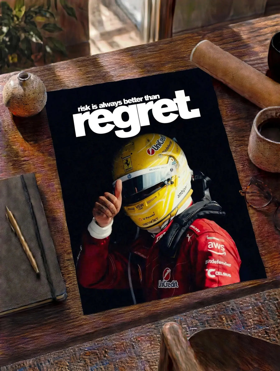 Wood-framed black poster with 'regret' text, red-suited racer with yellow helmet