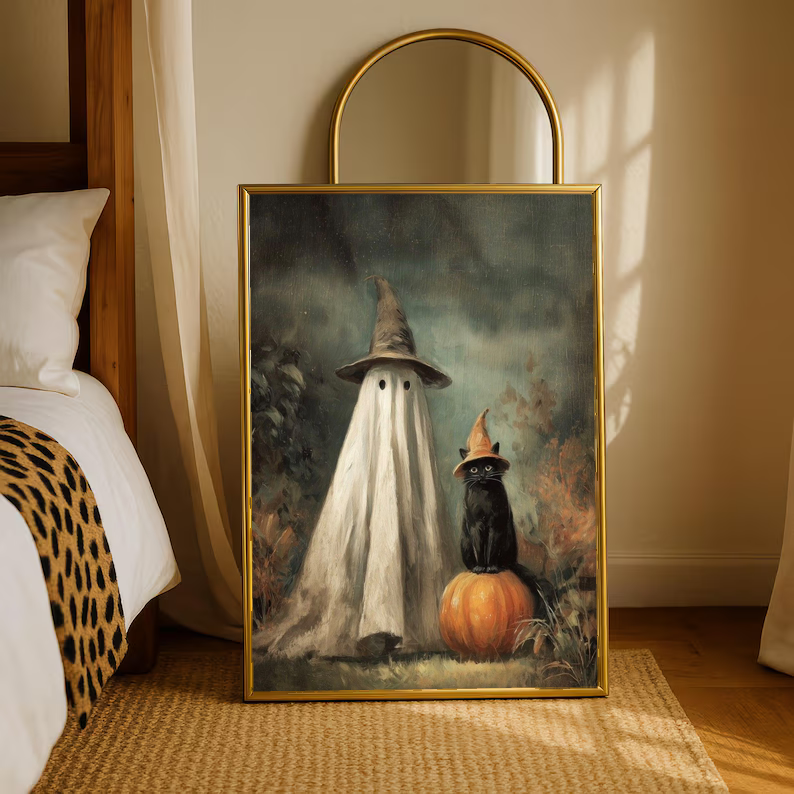 Ghost witch hat art print with gold frame, ghost in hat, black cat, and orange pumpkin