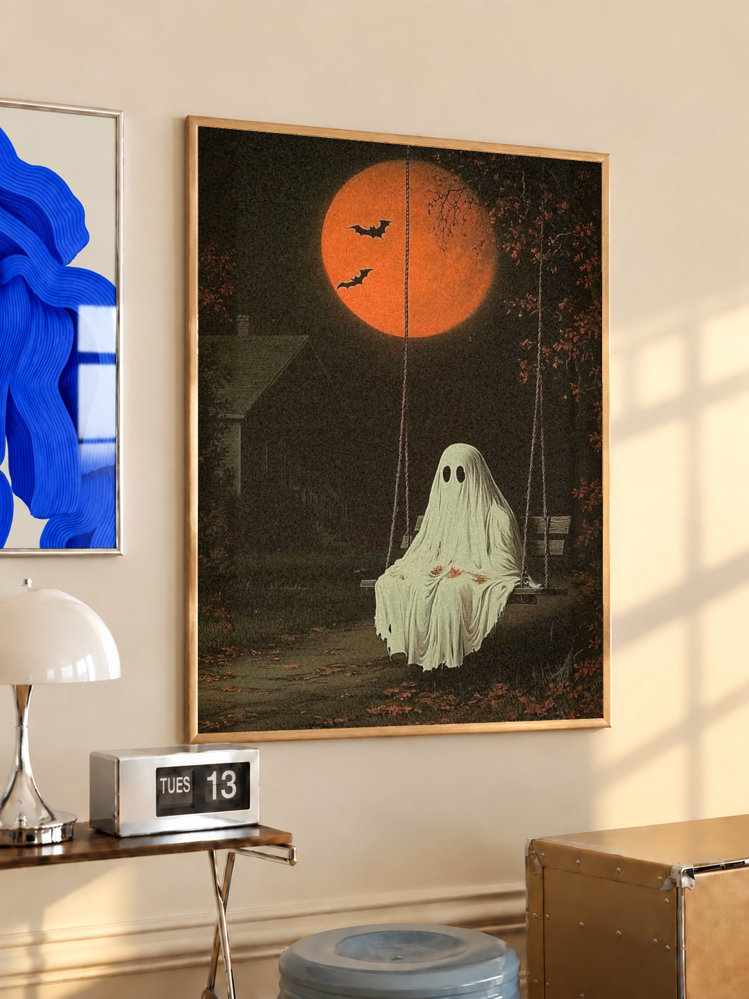 Framed ghost swing art print with orange moon and flying bats, dark frame