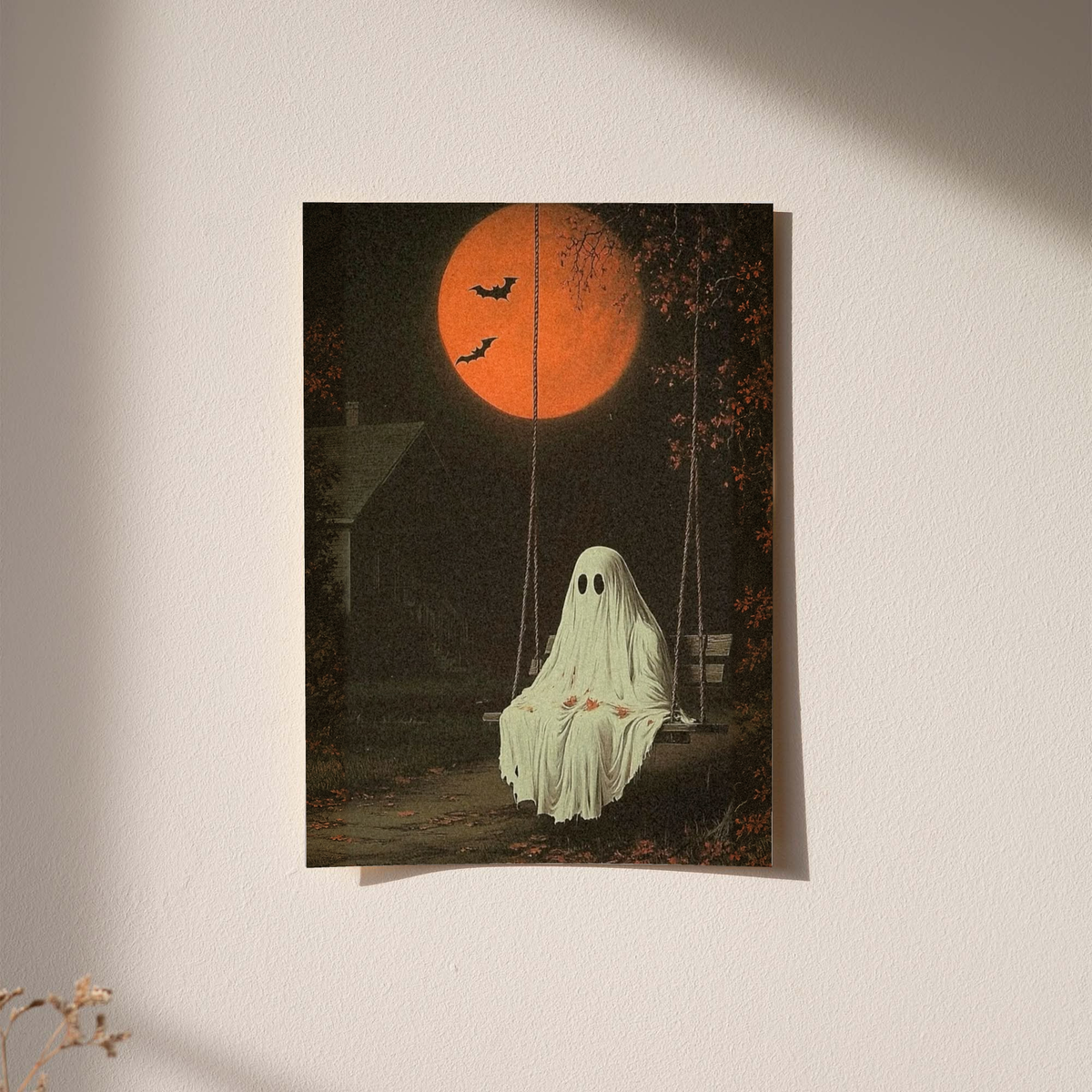Wall-hung ghost swing art print with orange moon, flying bats, and pale ghost figure
