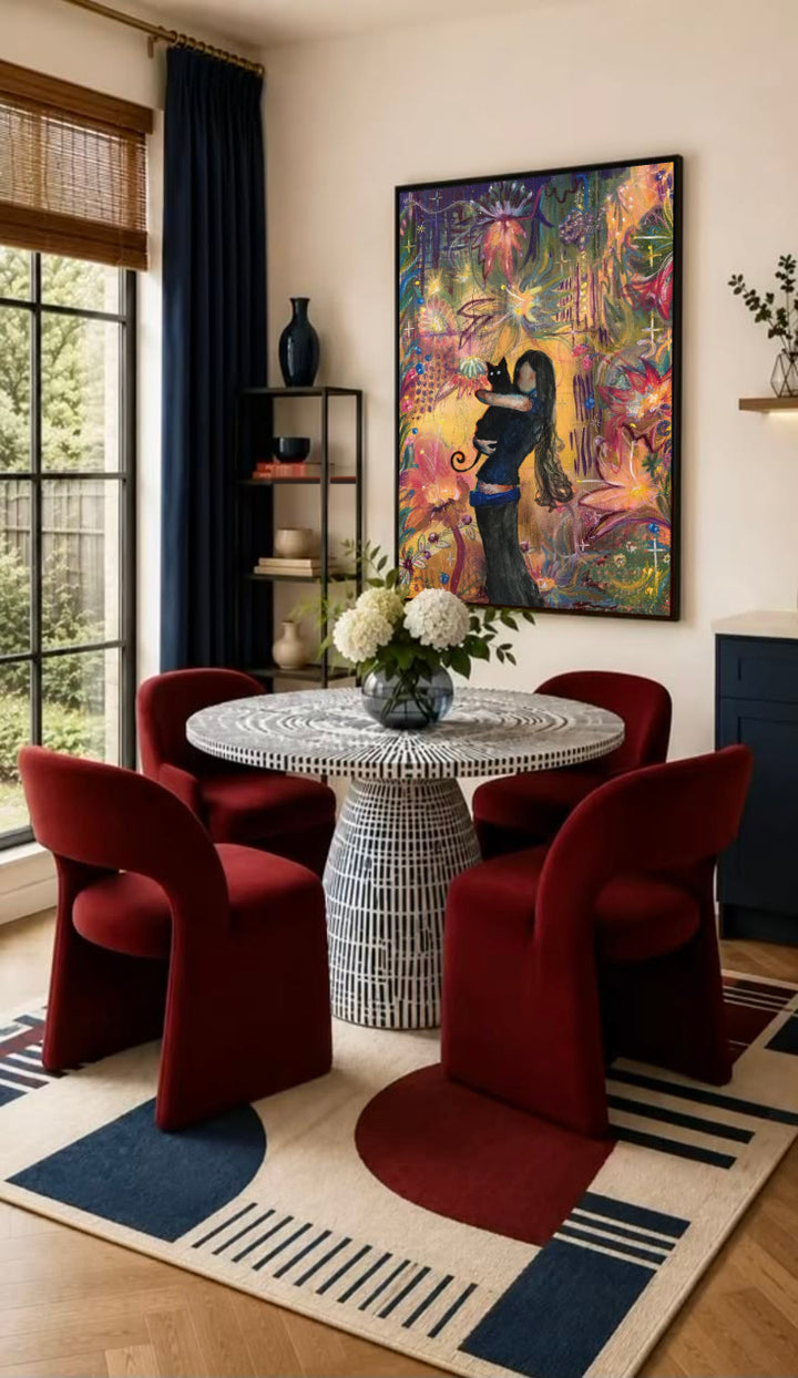 Framed art print of a girl hugging a black cat in colorful floral scene