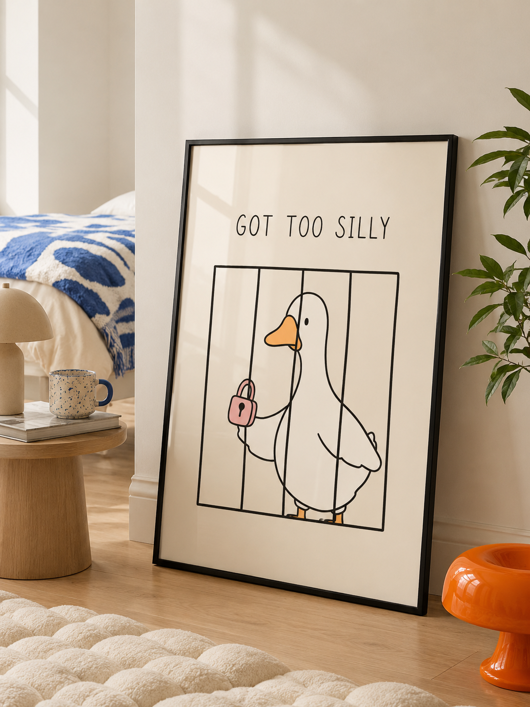 Black-framed goose wall art with 'GOT TOO SILLY' text and lock illustration