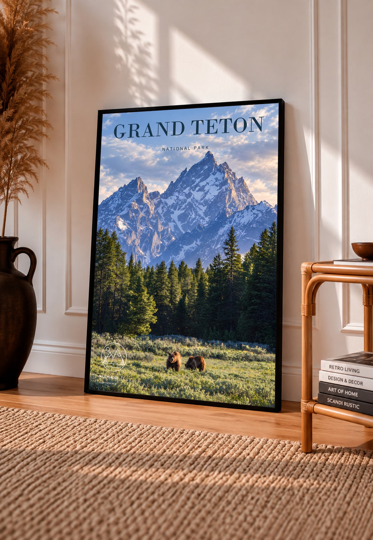 Framed Grand Teton poster depicting snowy peaks, evergreen trees, and two bears