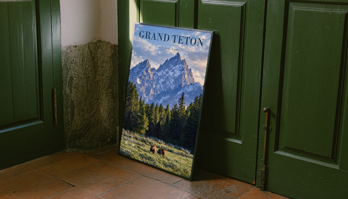 Grand Teton poster showing mountain peaks, trees, and bears in a meadow