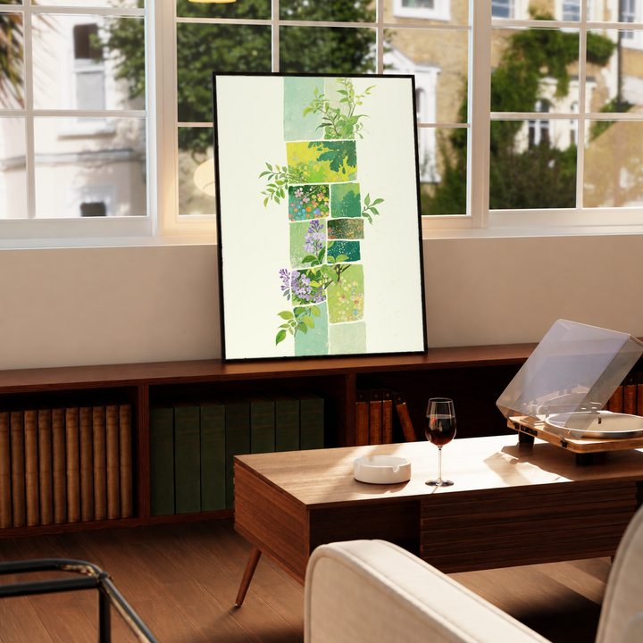 Green botanical patchwork in a black frame on a windowsill above a green radiator, with a turntable nearby