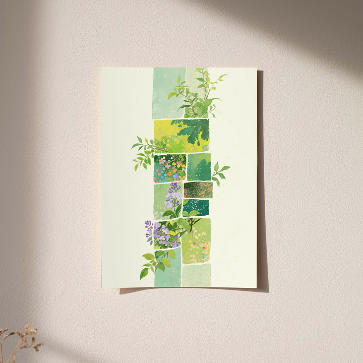 Green botanical patchwork as an unframed print against a pale plaster wall with soft shadows