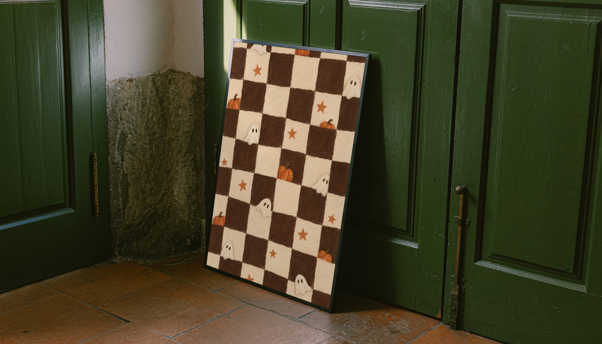 Brown and cream Halloween checkerboard with little white ghosts, pumpkins and orange stars leaning on the floor against dark green wall panelling